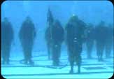 There's no better place than underwater for Army Divers to acknowledge their graduation of Dive school.